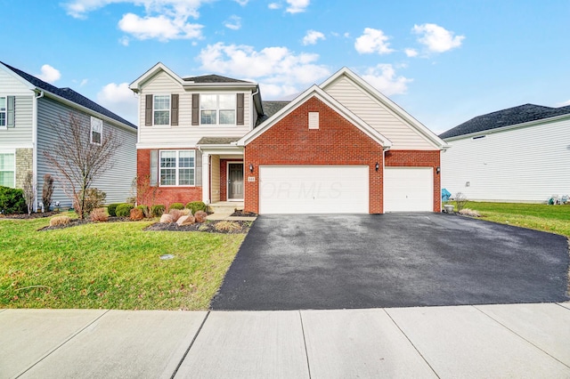 front of property featuring a garage and a front lawn