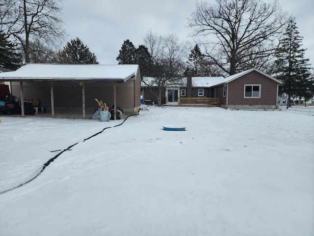 view of yard layered in snow