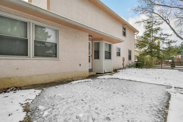 view of snow covered property