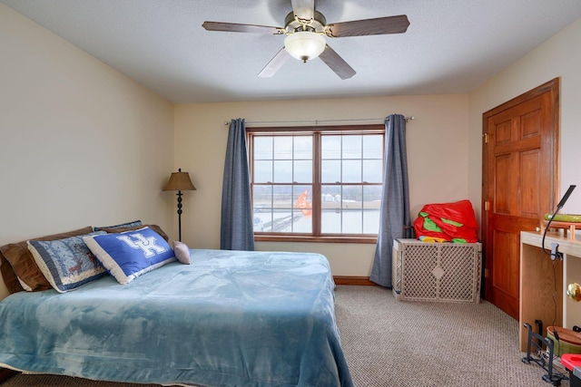 bedroom with light colored carpet and ceiling fan