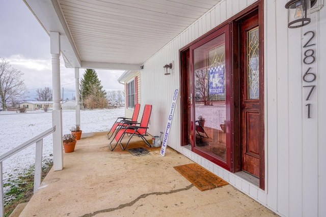 view of snow covered patio