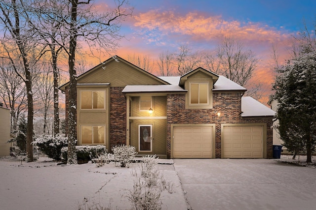 view of front of home with a garage