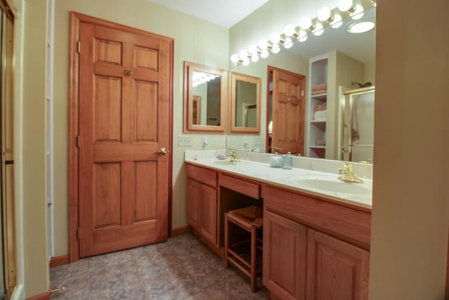 bathroom featuring vanity and walk in shower