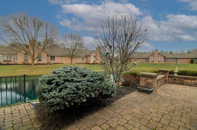 view of patio / terrace featuring a water view