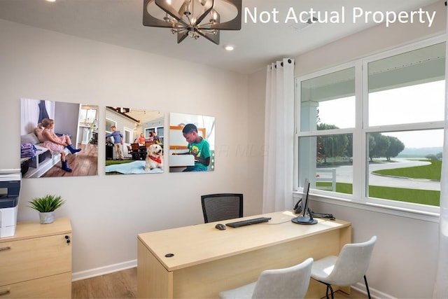 office area with light wood-style flooring, baseboards, a notable chandelier, and recessed lighting