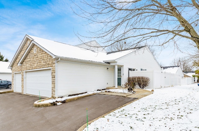 view of front of property featuring a garage