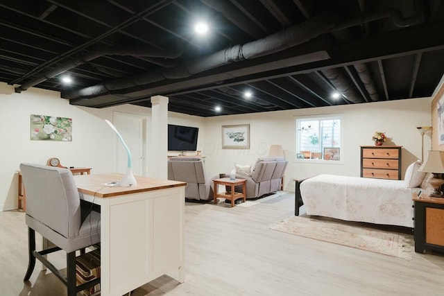 bedroom featuring light wood-type flooring