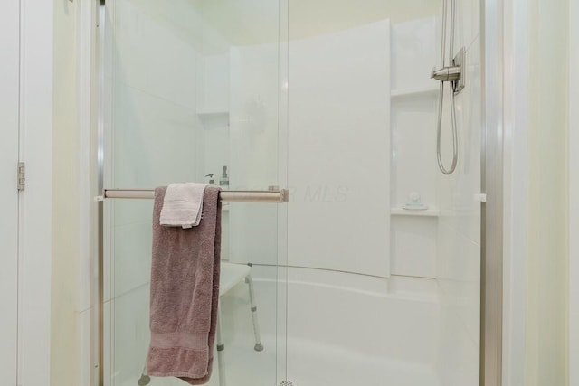 bathroom with an enclosed shower