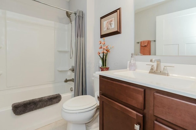 full bathroom featuring tile patterned floors, shower / bath combo, toilet, and vanity