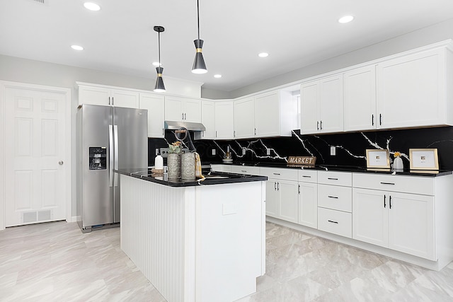 kitchen with pendant lighting, white cabinetry, decorative backsplash, a kitchen island, and stainless steel fridge with ice dispenser