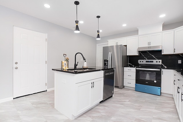 kitchen with a kitchen island with sink, sink, white cabinets, and appliances with stainless steel finishes