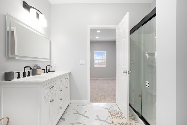 bathroom with vanity and walk in shower