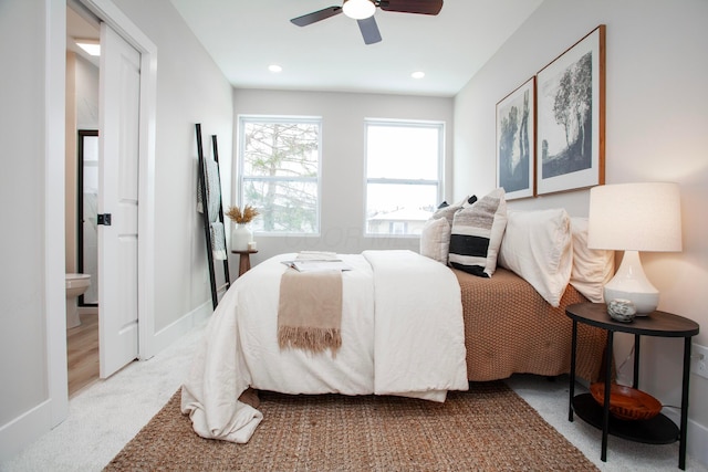 carpeted bedroom with ceiling fan