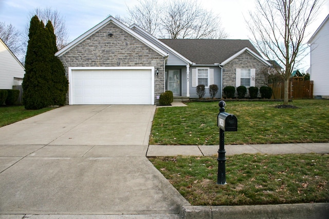 single story home featuring a garage and a front lawn