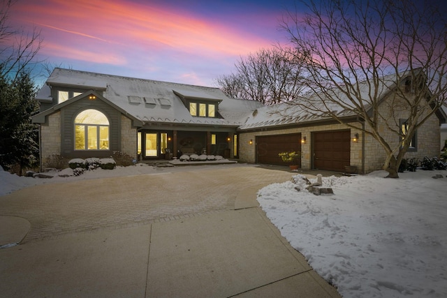 view of front of home with an attached garage and driveway