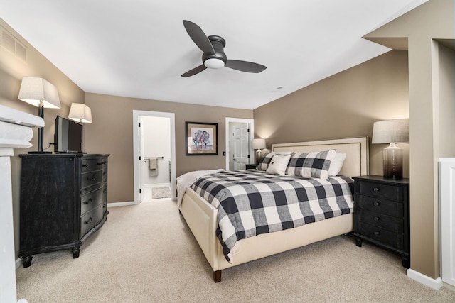 bedroom with visible vents, light carpet, connected bathroom, ceiling fan, and baseboards