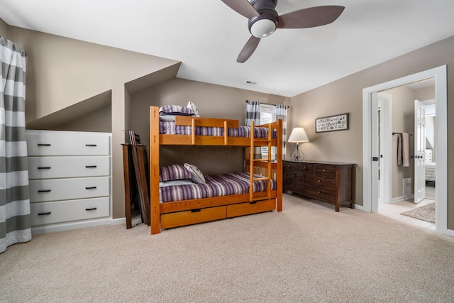 bedroom with vaulted ceiling, carpet floors, ceiling fan, and baseboards