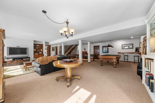 carpeted living area with billiards and stairs