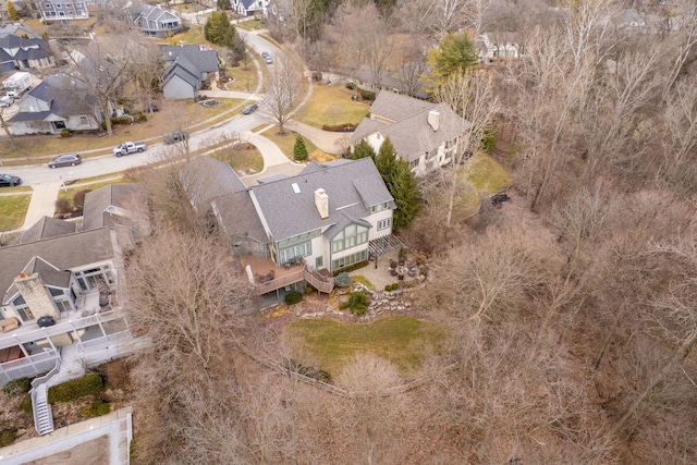 birds eye view of property with a residential view