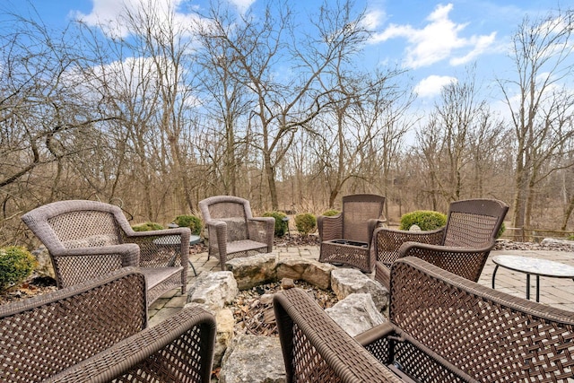 deck featuring an outdoor hangout area and a patio