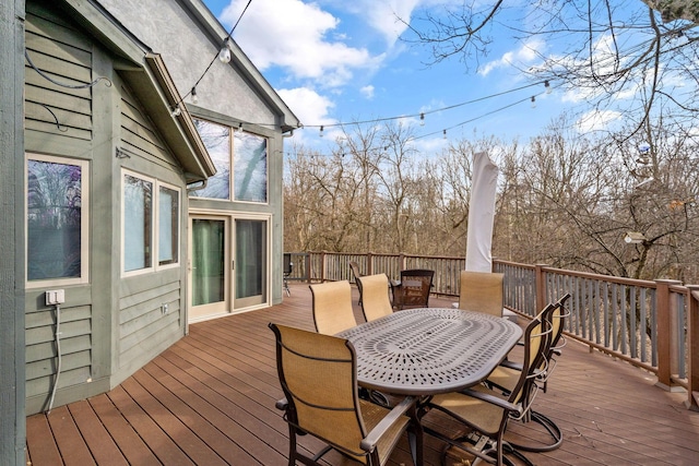 deck featuring outdoor dining space