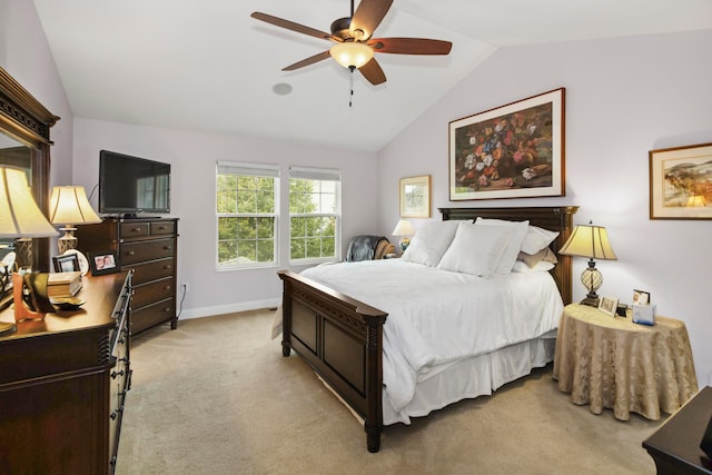 bedroom featuring light carpet, vaulted ceiling, and ceiling fan