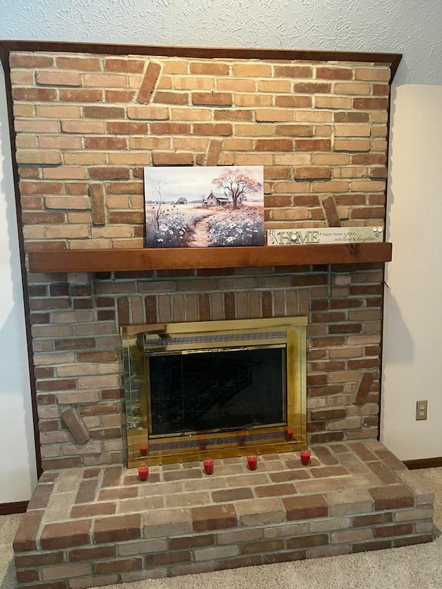 room details featuring carpet flooring and a fireplace