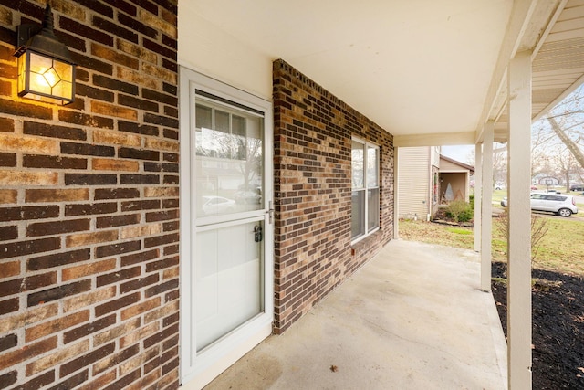 doorway to property featuring covered porch