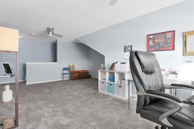 carpeted office featuring ceiling fan