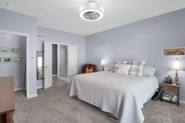 bedroom featuring light carpet