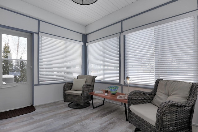 living area with light hardwood / wood-style flooring