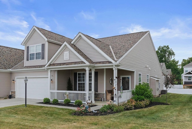 craftsman house featuring a garage, a front lawn, and a porch