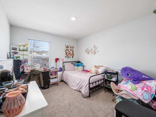 bedroom featuring light carpet