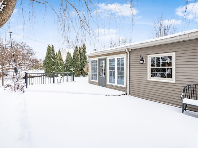 view of snow covered deck