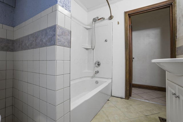 bathroom with tile patterned flooring, shower / bathing tub combination, crown molding, and sink