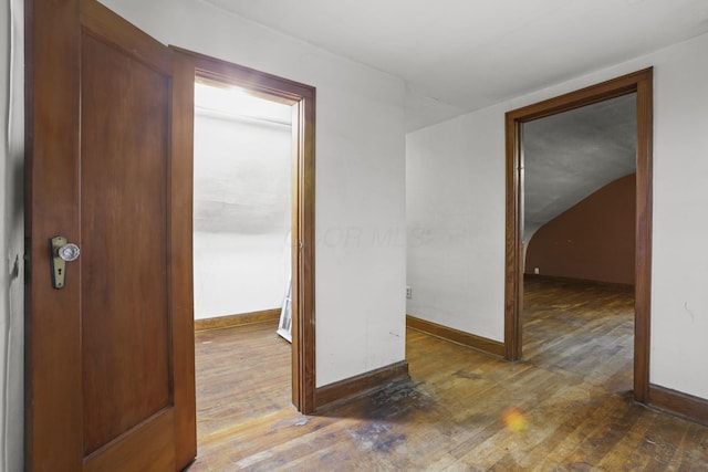 hallway featuring dark wood-type flooring