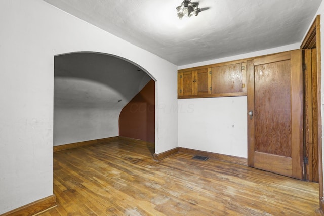 unfurnished room featuring light wood-type flooring