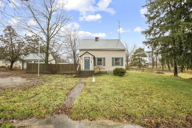 view of front of house featuring a front lawn