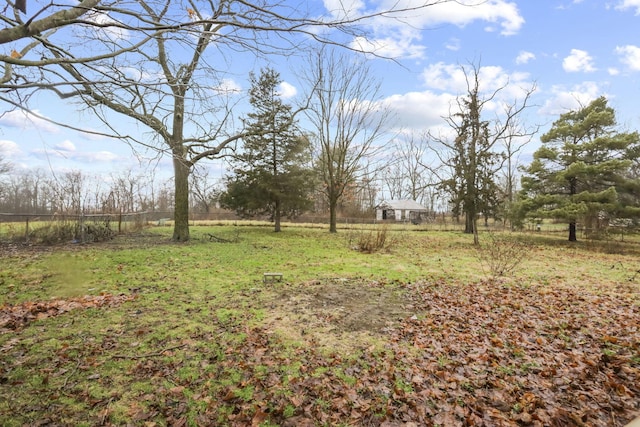 view of yard with a rural view