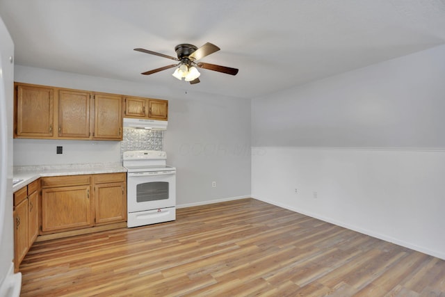 kitchen with decorative backsplash, light hardwood / wood-style floors, white electric range, and ceiling fan