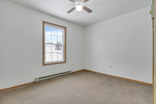 empty room featuring carpet, ceiling fan, and baseboard heating