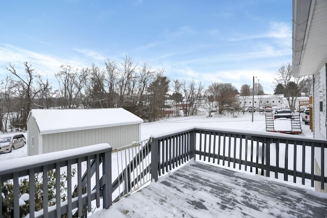 view of snow covered deck