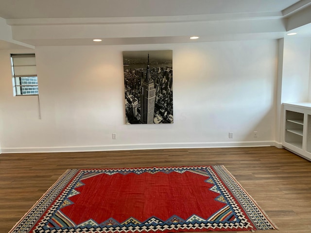 empty room with wood-type flooring