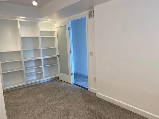 unfurnished bedroom with carpet