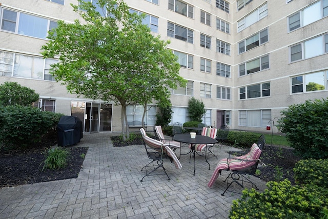 view of patio with a grill