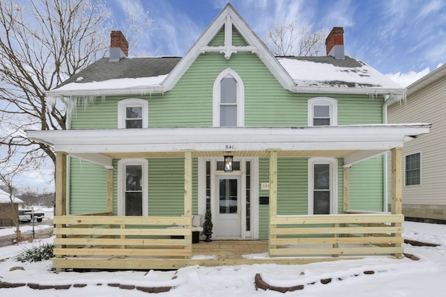 victorian home featuring covered porch