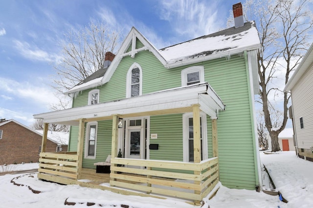 view of front of property featuring covered porch