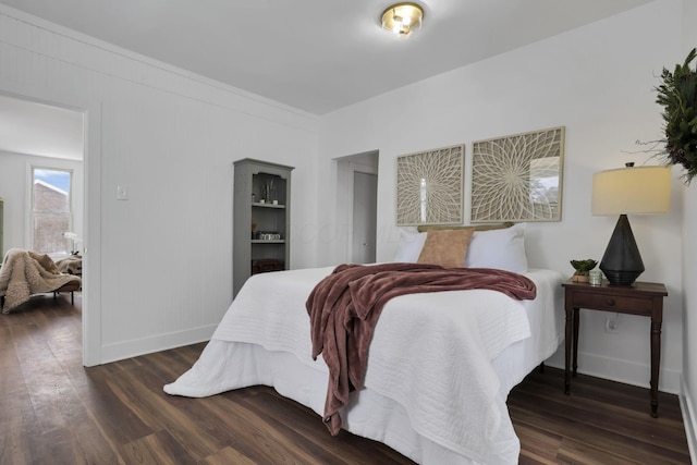 bedroom featuring dark hardwood / wood-style floors