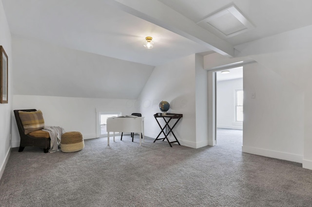 unfurnished room with vaulted ceiling with beams and carpet floors