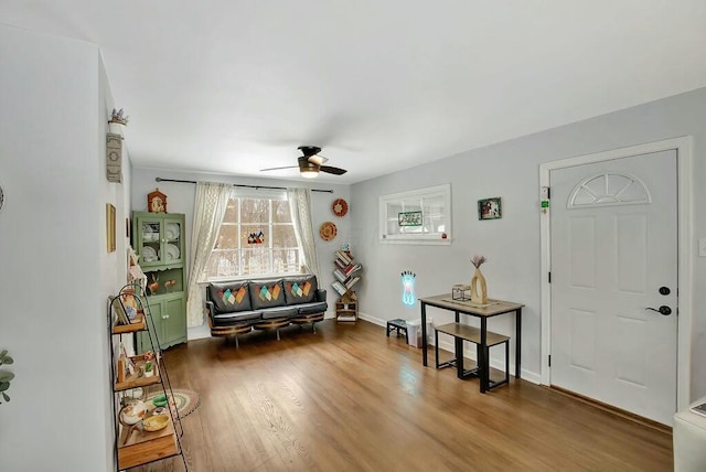 interior space featuring hardwood / wood-style floors and ceiling fan